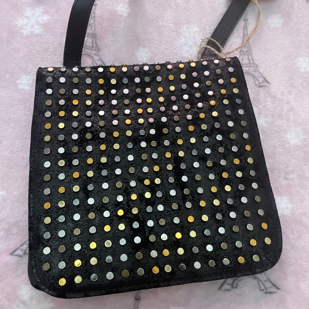 Patricia Nash Granada leather with 3 colors of studds. crossbody like new